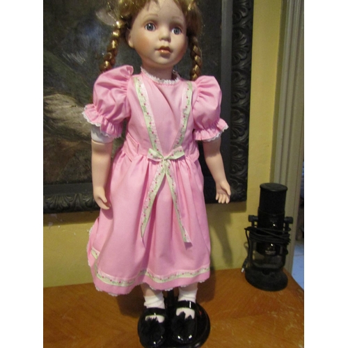 1207 - Porcelain Head Doll Approximately 24 Inches High