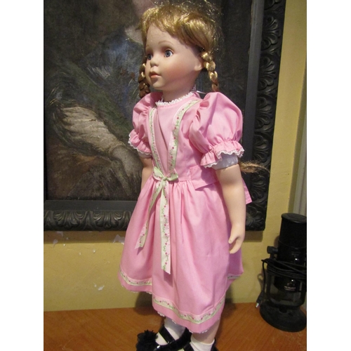 1207 - Porcelain Head Doll Approximately 24 Inches High