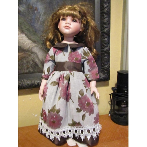 1208 - Porcelain Head Doll Approximately 24 Inches High