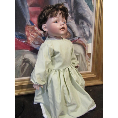 1211 - Porcelain Head Doll Approximately 24 Inches High