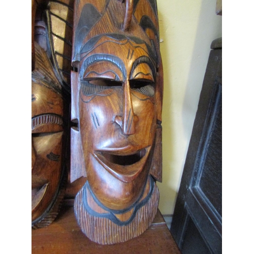 1296 - Pair of Vintage Carved Hardwood Tribal Masks Each Approximately 15 Inches High