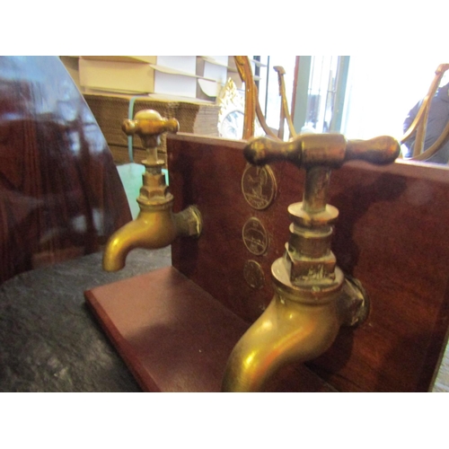 170 - Twin Brass Tap Stand Possibly Old Shop Display with Penny Farthing Inset Coins Approximately 9 Inche... 