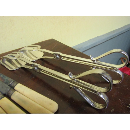 30 - Collection of Various Cutlery including Two Pairs of Serving Tongs