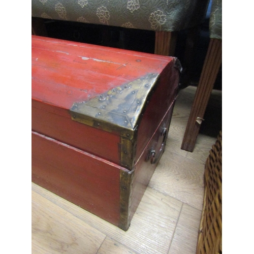 37 - Oriental Red Ground Dome Top Wooden Trunk with Brass Mounts Approximately 48 Inches Wide