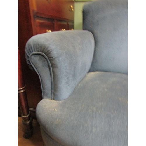 76 - Pair of Edwardian Rollarm Oversized Upholstered Armchairs