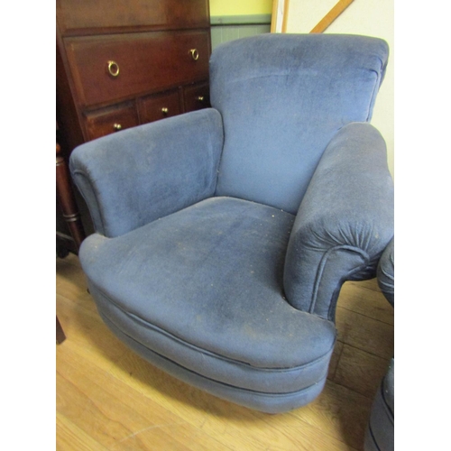 76 - Pair of Edwardian Rollarm Oversized Upholstered Armchairs