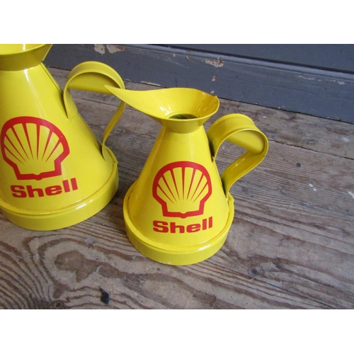 815 - Set of Five Enamel Decorated Shell Garage Oil Cans Graduated Form