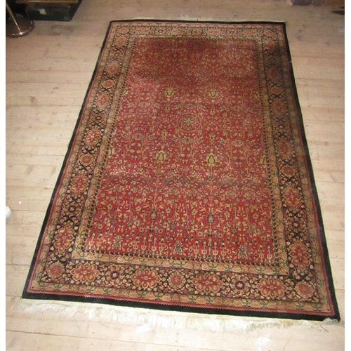 837 - Persian Pure Wool Rug Burgundy Ground with Patterned Borders Approximately 9ft Long x 5ft Wide