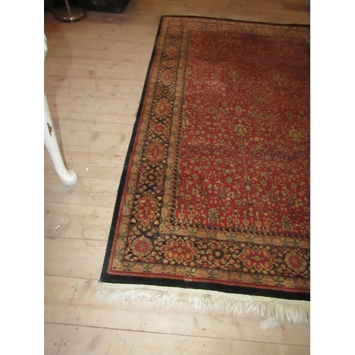 837 - Persian Pure Wool Rug Burgundy Ground with Patterned Borders Approximately 9ft Long x 5ft Wide