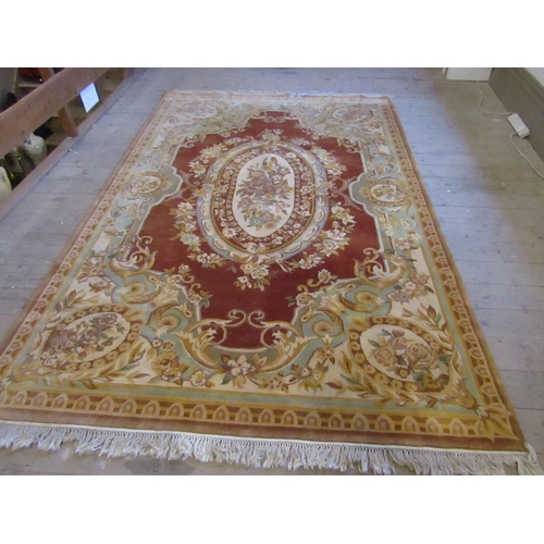 838 - Ochre Ground Pure Wool Rug with Central Medallion Motif Approximately 9ft Long x 6ft Wide