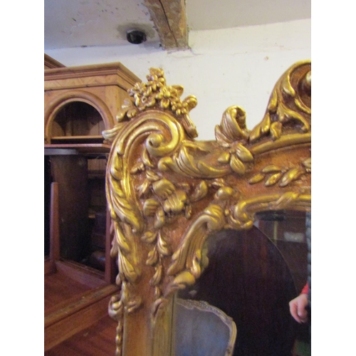 93 - Gilded Rectangular Form Wall Mirror with Carved Decoration Approximately 5ft 4 Inches High x 2ft 8 I... 