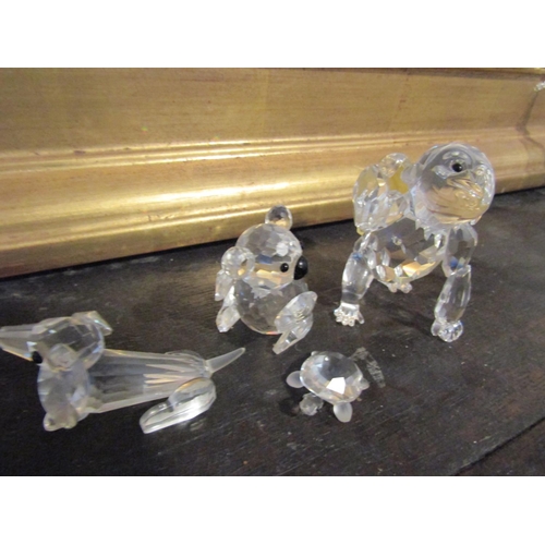 975 - Large Collection of Swarovski Crystal Figurines.