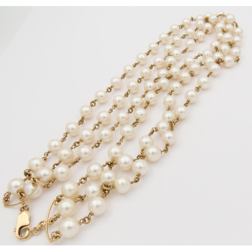31 - Pearl Three Strand Ladies Necklace of Attractive Hue Set on 18 Carat Yellow Gold Necklace Length 48c... 