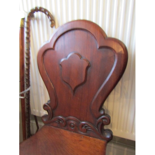 4 - Irish William IV Pair of Mahogany Hall Chairs with Shield Form Back above Turned Supports