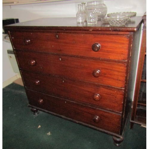 107 - George III Mahogany Chest of Four Long Drawers Above Turned Supports