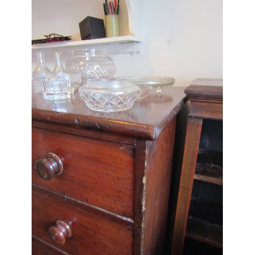 107 - George III Mahogany Chest of Four Long Drawers Above Turned Supports