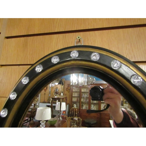 139 - Oval Form Crystal Mounted Wall Mirror with Gilded and Ebonised Decoration Approximately 26 Inches Hi... 