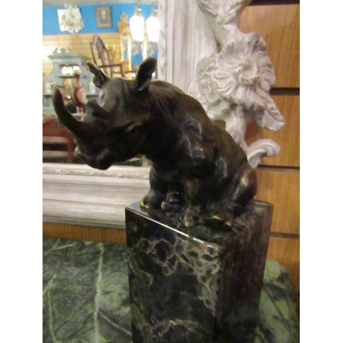 145 - Bronze Sculpture of Seated Rhinoceros on Cube Form Marble Base Approximately 9 Inches High