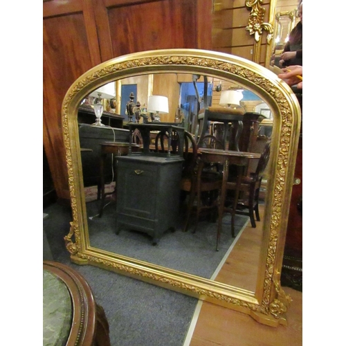 170 - Gilded Over Mantle Mirror Dome Form with Side Carved Decoration Approximately 4ft Wide x 4ft 6 Inche... 