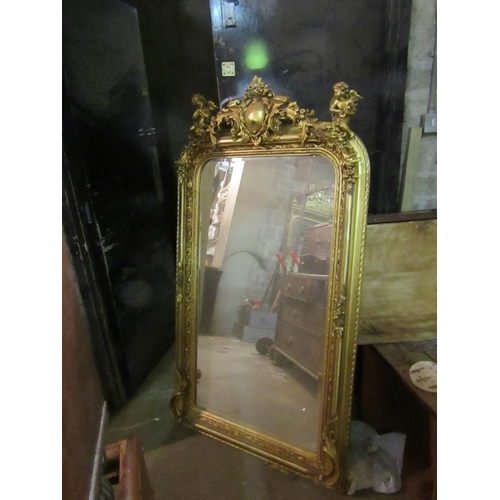 184 - Gilded Wall Mirror Rectangular Form with Cherub Motif Surmounts Approximately 5ft 8 Inches High x 2f... 