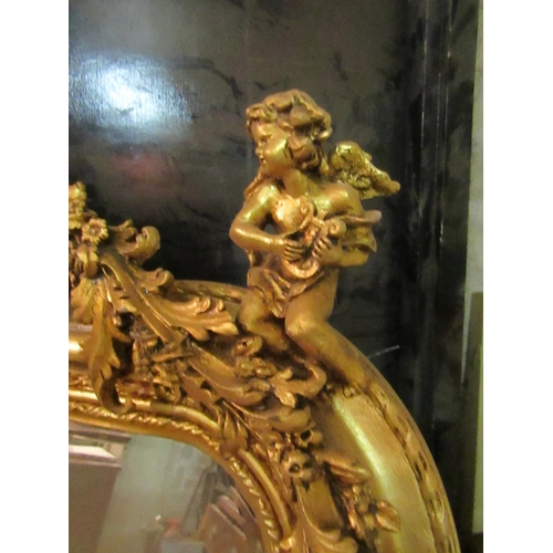 184 - Gilded Wall Mirror Rectangular Form with Cherub Motif Surmounts Approximately 5ft 8 Inches High x 2f... 