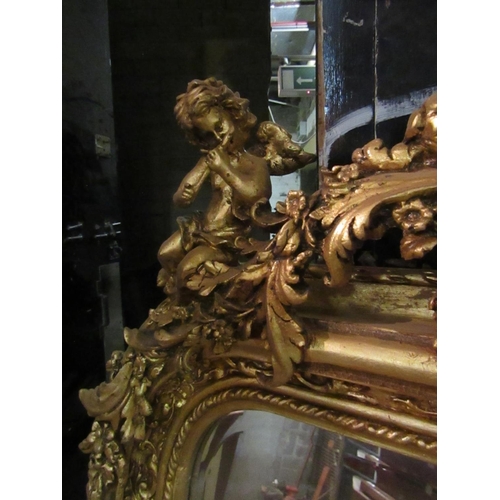 184 - Gilded Wall Mirror Rectangular Form with Cherub Motif Surmounts Approximately 5ft 8 Inches High x 2f... 