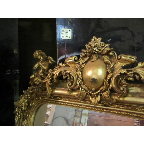 184 - Gilded Wall Mirror Rectangular Form with Cherub Motif Surmounts Approximately 5ft 8 Inches High x 2f... 