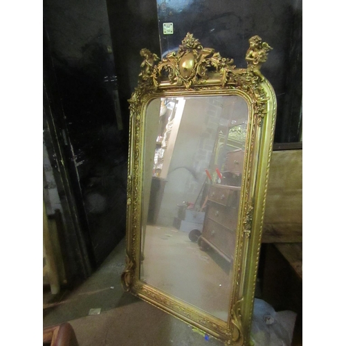 185 - Matching Gilded Wall Mirror Rectangular Form with Cherub Motif Surmounts Approximately 5ft 8 Inches ... 