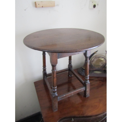 5 - Circular Form Oak Occasional Table on Turn Supports Approximately 18 Inches Diameter x 22 Inches Hig... 