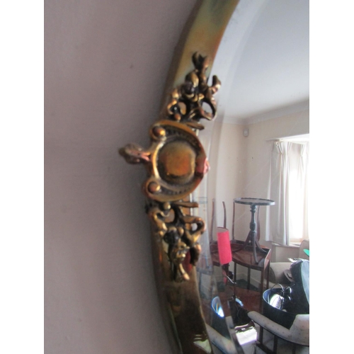 79 - Antique Cast Brass Circular Form Wall Mirror with Applied Decorations Approximately 18 Inches Diamet... 