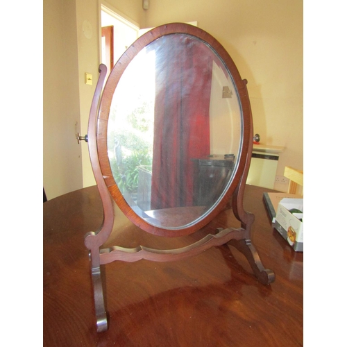 82 - Edwardian Mahogany Framed Oval Form Table Mirror Approximately 24 Inches High