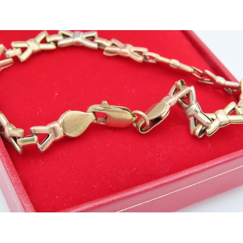1 - 9 Carat Yellow Gold Bracelet of Interlinking Form with Lobster Claw Clasp
Please Note: The Next 59 L... 