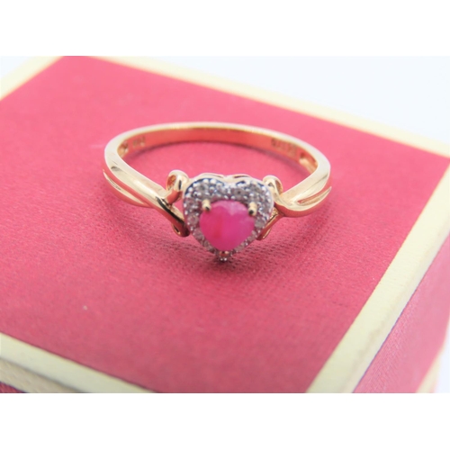 116 - Diamond and Ruby Heart Motif Ladies Ring Mounted on 9 Carat Yellow Gold Ring Size M