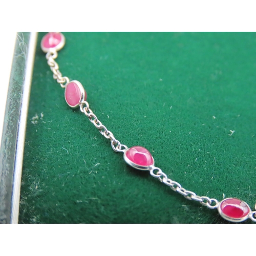 120 - 18 Carat Yellow Gold Ladies Bracelet with Cabochon Cut Ruby Insets Approximately 18cm Long