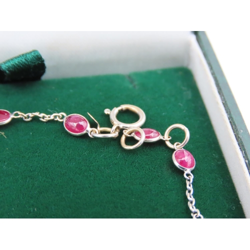 120 - 18 Carat Yellow Gold Ladies Bracelet with Cabochon Cut Ruby Insets Approximately 18cm Long