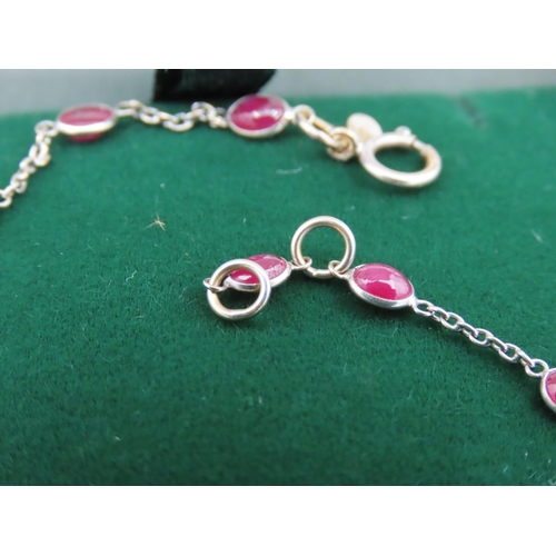 120 - 18 Carat Yellow Gold Ladies Bracelet with Cabochon Cut Ruby Insets Approximately 18cm Long