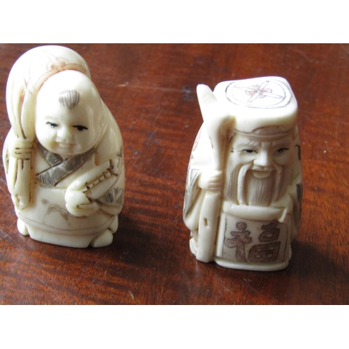 140 - Two Carved Oriental Netsuke Each Approximately 5cm High