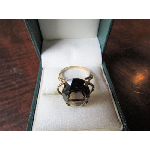 143 - Smokey Quartz Ladies Dress Ring Mounted on 9 Carat Yellow Gold Band Ring Size M