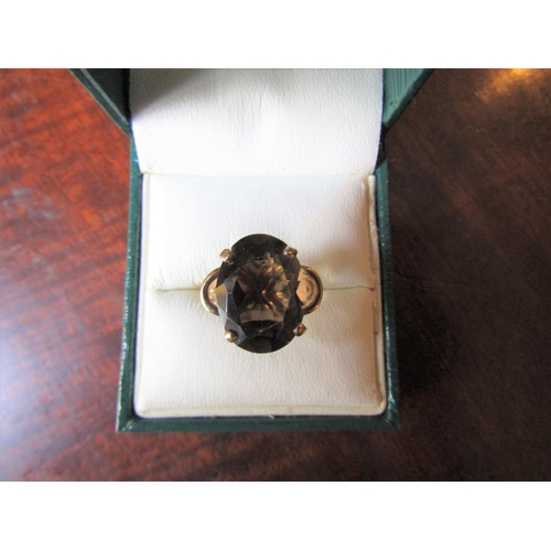 143 - Smokey Quartz Ladies Dress Ring Mounted on 9 Carat Yellow Gold Band Ring Size M