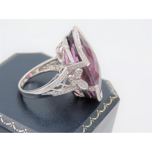 167 - Halo Diamond Set Tourmaline Centre Stone Ladies Ring Mounted on 18 Carat White Gold Band with Furthe... 