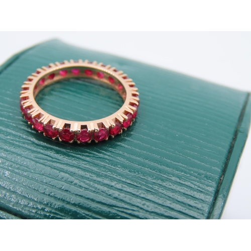 169 - 18 Carat Yellow Gold Set Ruby Eternity Ring Size K Rubies Approximately 2 Carats