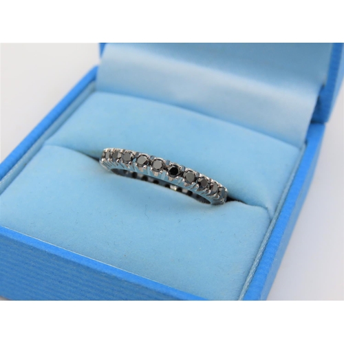 170 - Sapphire Set Ladies Eternity Ring Mounted on 18 Carat White Gold Ring L and a Half