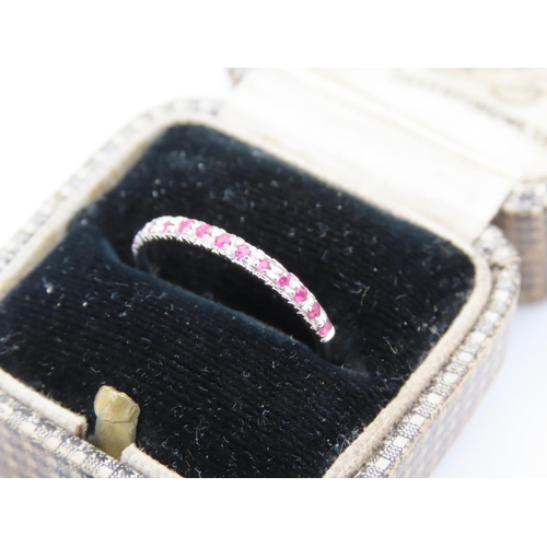 181 - Ruby Set Ladies Eternity Ring Mounted on 18 Carat White Gold Ring Size J