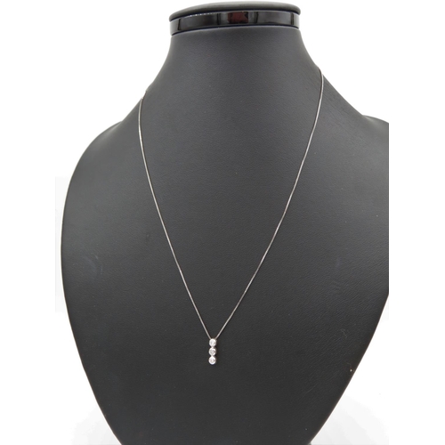 193 - Three Stone Diamond Pendant Necklace Attractively Set Mounted on Further 18 Carat Gold Chain