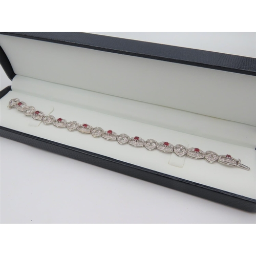 194 - Diamond and Ruby Set Ladies Bracelet Articulated Form Attractively Set Good High Colour Rubies of De... 