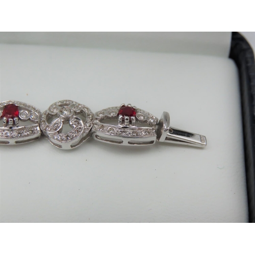 194 - Diamond and Ruby Set Ladies Bracelet Articulated Form Attractively Set Good High Colour Rubies of De... 