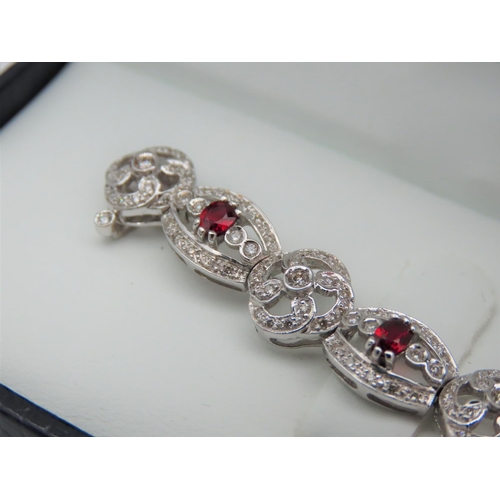 194 - Diamond and Ruby Set Ladies Bracelet Articulated Form Attractively Set Good High Colour Rubies of De... 