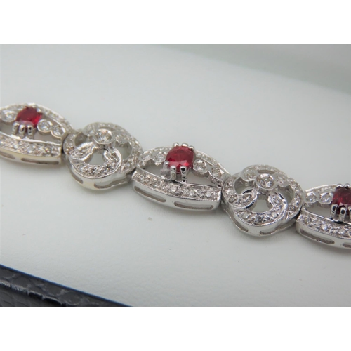 194 - Diamond and Ruby Set Ladies Bracelet Articulated Form Attractively Set Good High Colour Rubies of De... 