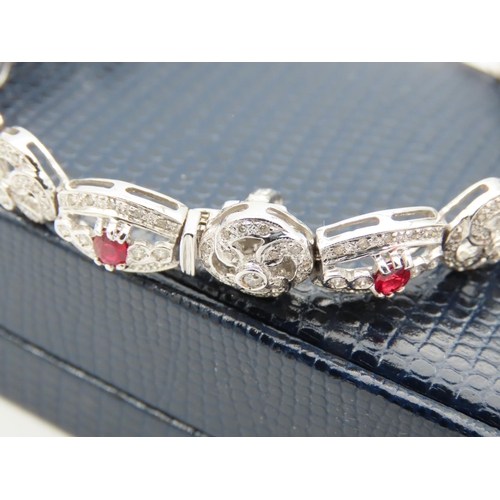 194 - Diamond and Ruby Set Ladies Bracelet Articulated Form Attractively Set Good High Colour Rubies of De... 