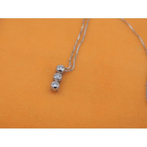 197 - Three Stone Diamond Ladies Solitaire Necklace Mounted on 18 Carat White Gold Set on Further 18 Carat... 